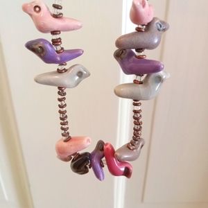 NEW.  MULTI COLORED CERAMIC GLASS BIRD BEADS-SHADES OF PURPLE, PINK, GRAY  22.5"